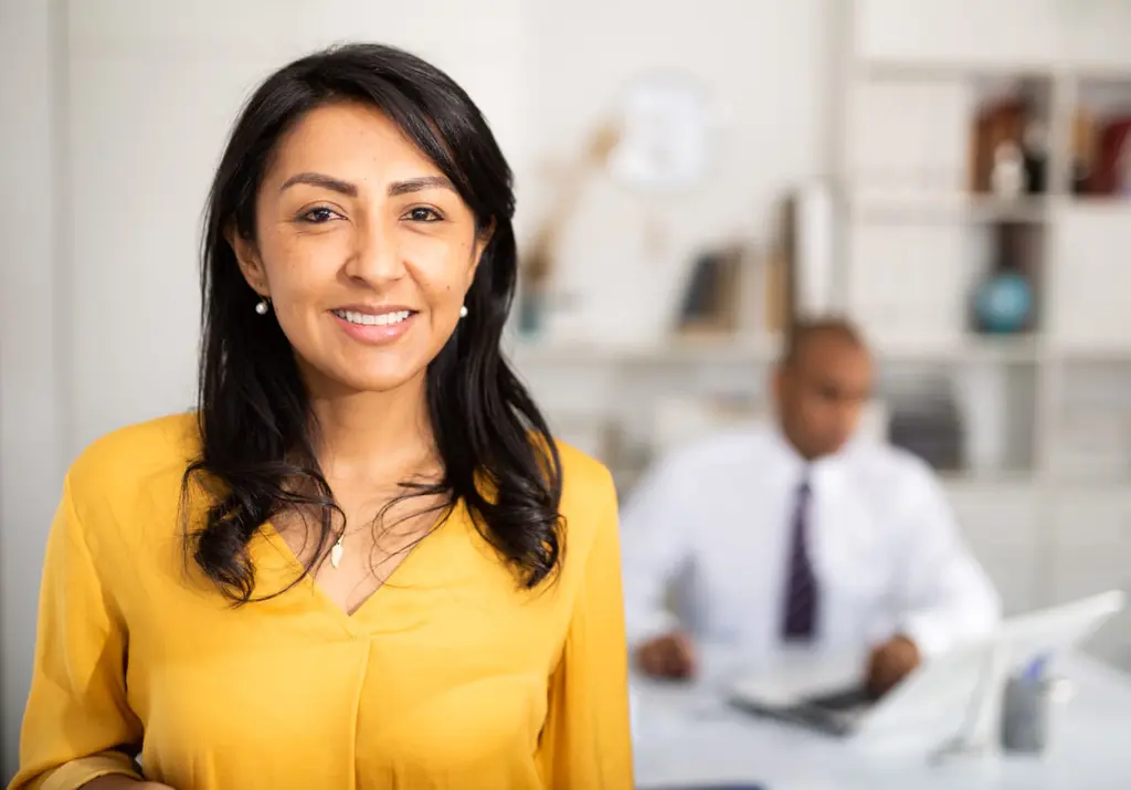 Confident practitioner in a modern office